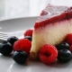 cheesecake surrounded by berries
