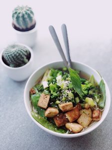 bowl of tofu and greens