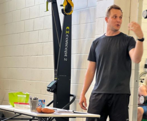 personal trainer talking at a nutrition seminar
